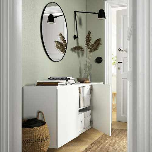 Modern wall-mounted BESTÅ cabinet with open doors, shelves and decor.