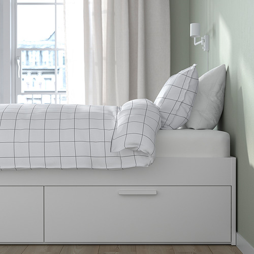 Cama con cajones y laterales ajustables.