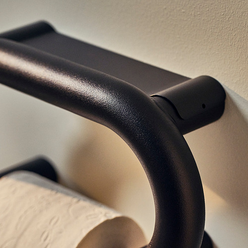 Portarrollos de papel higiénico BÄSINGEN negro en gris oscuro, de pared, diseño curvo sin tornillos visibles.