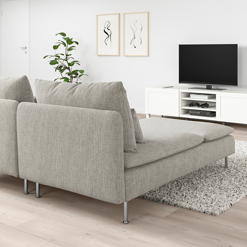 Salón moderno con sofá SÖDERHAMN gris y planta, arte minimalista.