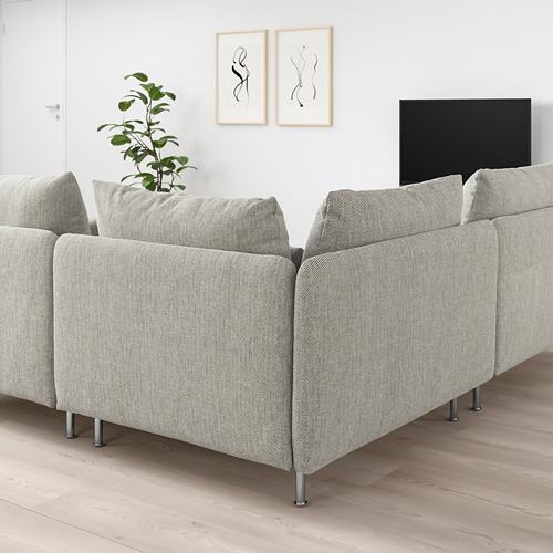 Sala de estar moderna con sofá modular SÖDERHAMN gris, TV y planta.