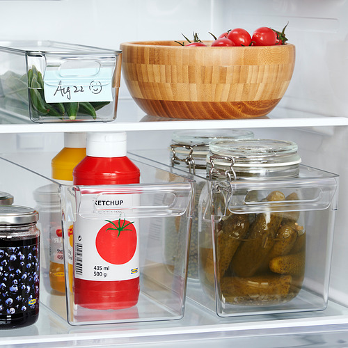 Las cajas de almacenamiento transparentes del refrigerador contienen salsa de tomate, pepinillos y tomates; Apilable, con tapas para mayor frescura.