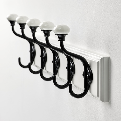 Elegante perchero negro con 5 pomos de porcelana, diseño robusto para colgar.