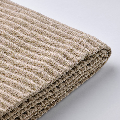 Funda de sofá beige, suave, neutra.