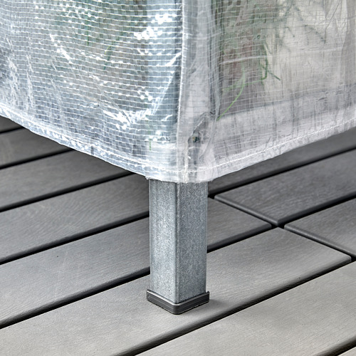 Estantería cubierta con patas metálicas, apta para uso en exteriores o interiores, que ofrece protección contra el polvo y la lluvia.