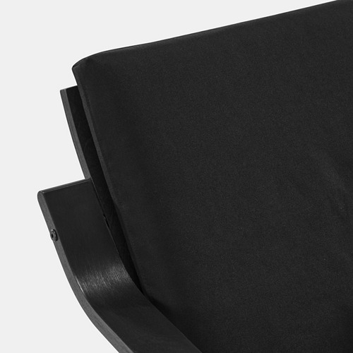 Sillón moderno negro con diseño elegante, respaldo curvo y acolchado de felpa. Ideal para espacios contemporáneos.