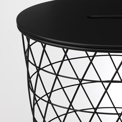 Moderna mesa auxiliar negra con elegante tapa redonda y una intrincada base de alambre, que ofrece un almacenamiento elegante.