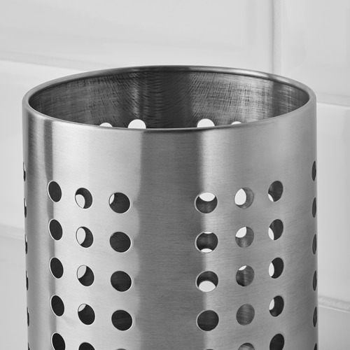 Accesorio de cocina de acero inoxidable con diseño perforado que garantiza durabilidad y fácil limpieza.