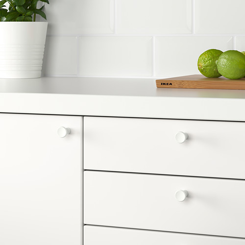 Cajón de cocina con pomos GUBBARP, limas, planta verde.