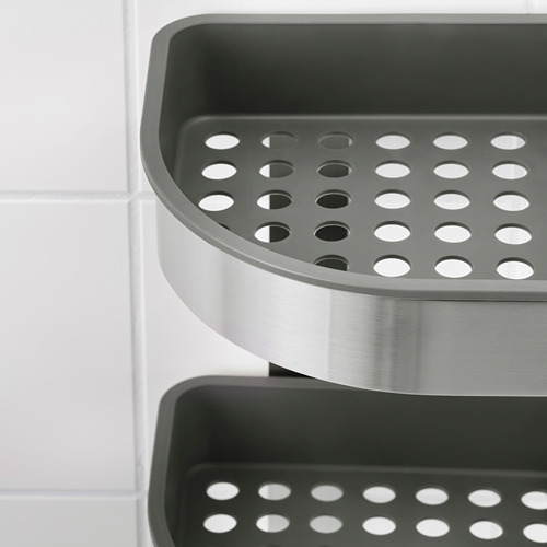 Moderno estante de almacenamiento de baño de acero inoxidable y plástico, con diseño perforado para drenaje.