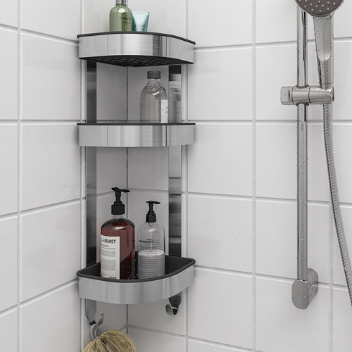 Estante de esquina de baño BROGRUND, contiene botellas y artículos pequeños, bordes gruesos, ganchos debajo.