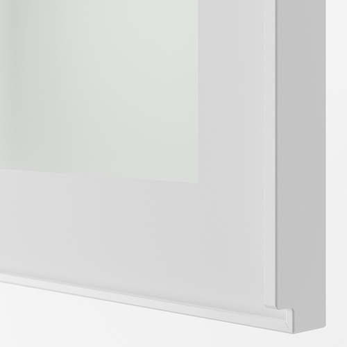 Primer plano del borde de la puerta de vidrio HEJSTA, elegante acabado blanco, diseño moderno y limpio.