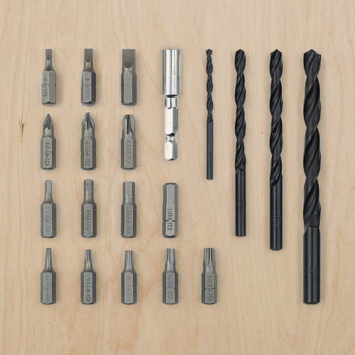 Juego de herramientas TRIXIG: surtido de destornilladores y taladros negros, almacenados en una caja magnética apilable de plástico gris.