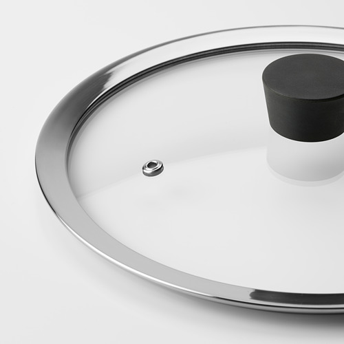 Primer plano de la tapa de vidrio templado, borde plateado, mango negro