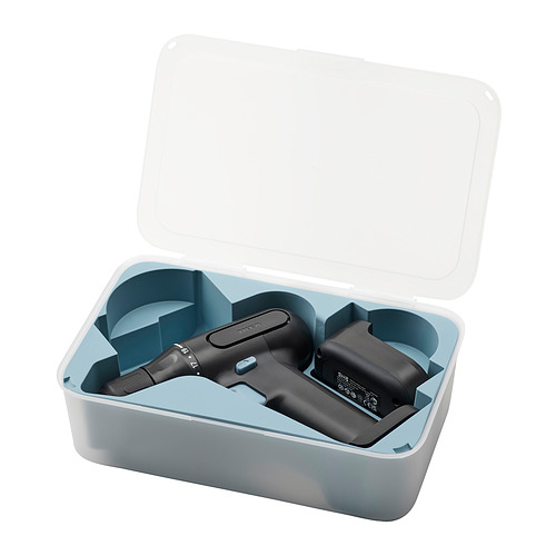 La caja de herramientas gris abierta con inserciones azules sostiene el dispositivo TRIXIG negro.