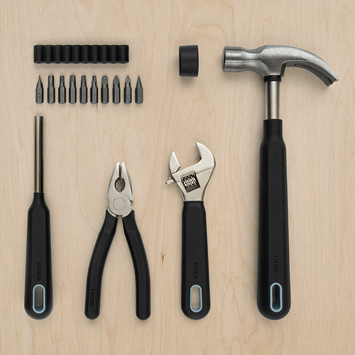 Juego de herramientas TRIXIG, negro, varias formas, materiales duraderos, organizado en madera.