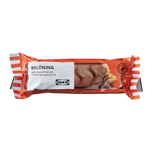 Ikeas beloning chocolate bar with caramel and almonds, wrapped in orange packaging.