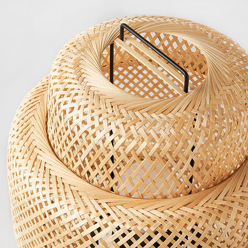 Handwoven bamboo floor lamp, sturdy metal handle, intricate natural weave, warm light, elegant design.