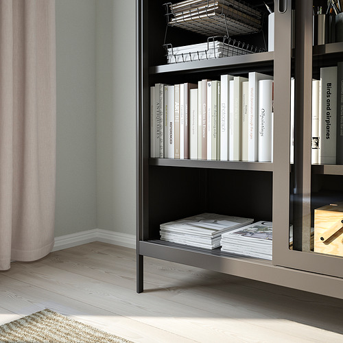 Estantería con puertas correderas de vidrio para libros, manteniendo alejado el polvo. El diseño de vidrio templado y metal ofrece durabilidad y una sensación de amplitud.