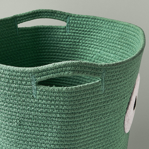 Cesta de almacenamiento de algodón tejido verde con asas resistentes y divertido detalle de cara de búho, diseñada para un uso apto para niños.