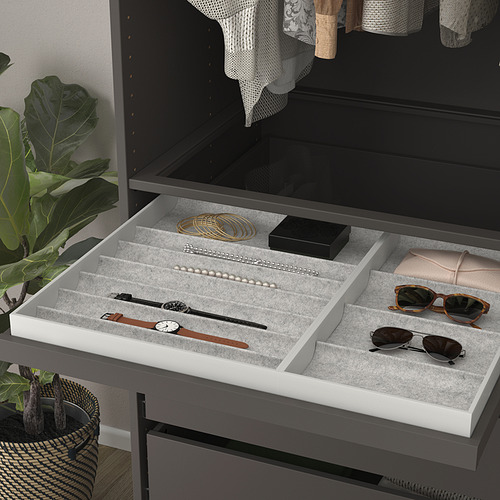 Open drawer tray with jewelry and accessories. Includes compartments, felt liner, and slow-closing mechanism.