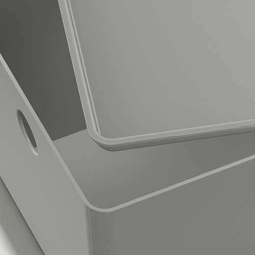 Primer plano de la elegante y moderna caja KUGGIS gris con bordes lisos y un pequeño asa en el lateral.