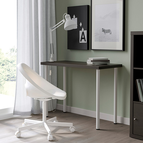 Modern home office setup with LINNMON black desk, white swivel chair, & stylish wall art.