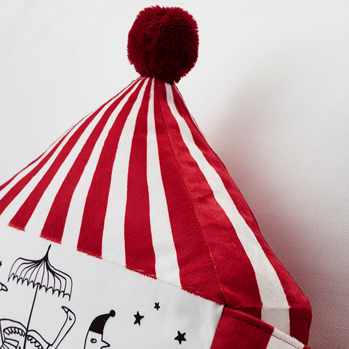 Almohada de rayas rojas y blancas con pompón, con diseño circense.