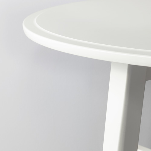 Borde circular de la mesa blanca; Acabado moderno y liso.