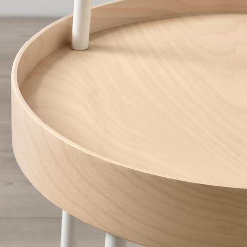 Una mesa auxiliar redonda de madera bellamente elaborada con un acabado suave y ligero y un mango resistente, perfecta tanto para el estilo como para la función.