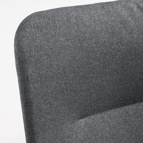 Elegante sillón gris oscuro de líneas suaves y respaldo de apoyo, que rezuma alta calidad y comodidad.