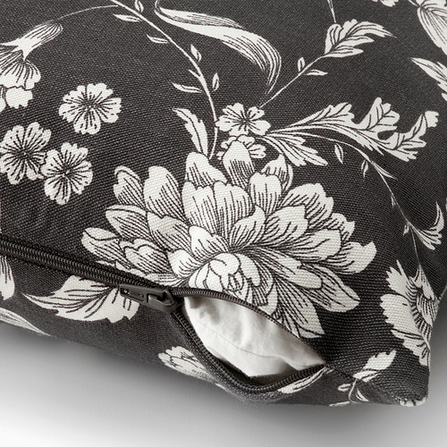 Funda de cojín con estampado floral en blanco y negro con cremallera. Diseño de flores y hojas, se adapta a cojines de 50x50 cm.