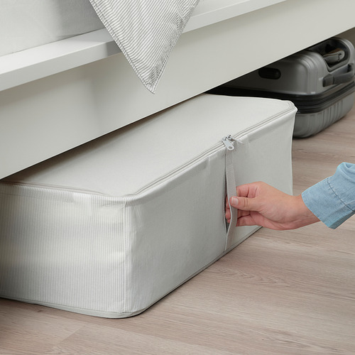 Caja de almacenamiento de tela que se abre a mano.