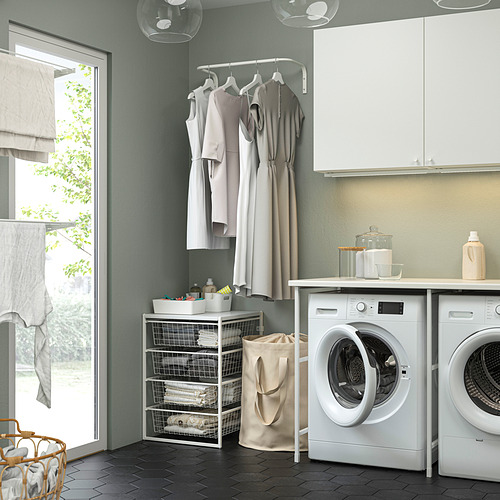 Cuarto de lavado con electrodomésticos blancos y bodega JONAGEL.