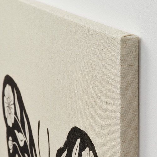 Primer plano de obras de arte en lienzo hechas a mano con textura visible, que muestran profundidad y calidad.