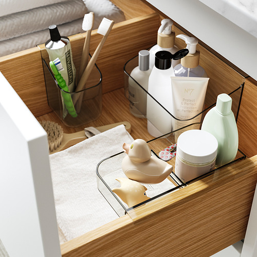 Organizador de cajones de baño con soporte para cepillo de dientes, botella y bandeja.