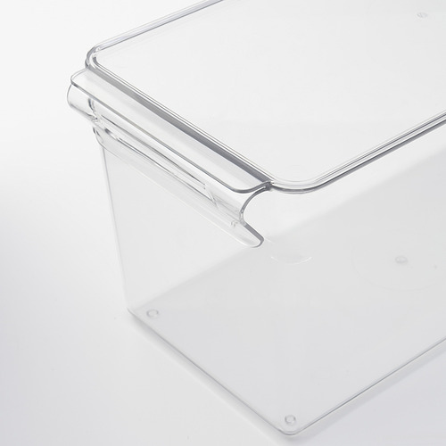 Caja de almacenamiento de plástico transparente y apilable con tapa y asa para organizar el refrigerador.