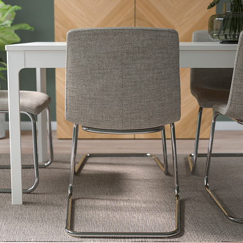 La moderna silla en voladizo con respaldo y asiento tapizados ofrece asientos cómodos y flexibles. Fácil de limpiar con funda extraíble y lavable.