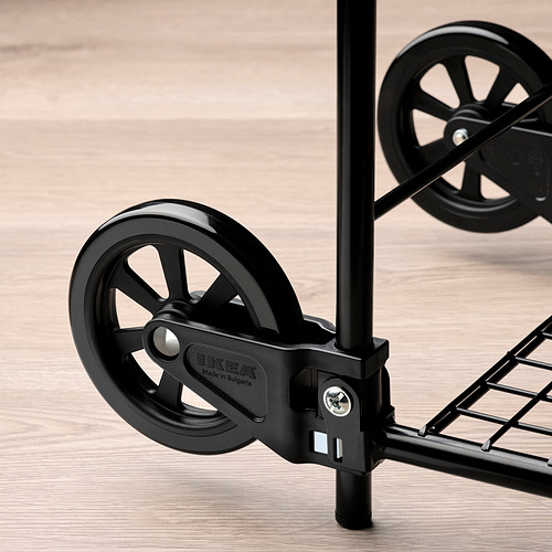 Rueda de carro RULLEBÖR de ikea negra, montada sobre un robusto bastidor metálico, diseñada para un uso pesado.