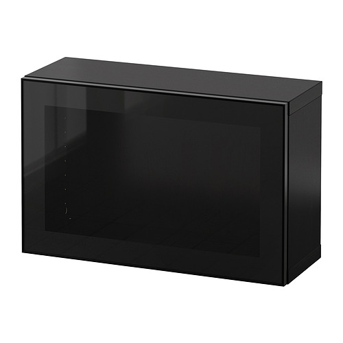 Armario BESTÅ negro con puerta de cristal, elegante diseño rectangular para un almacenamiento moderno.
