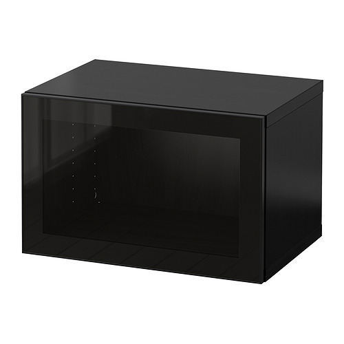 Mueble de almacenaje BESTÅ negro, forma rectangular, puerta de cristal, diseño moderno.