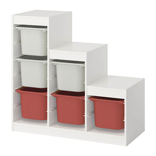 The white ikea TROFAST storage unit with red and white plastic bins. It has three shelves with a staggered design.