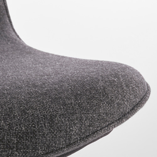 Primer plano de un asiento acolchado de una silla de oficina moderna, con tela y costuras de alta calidad.