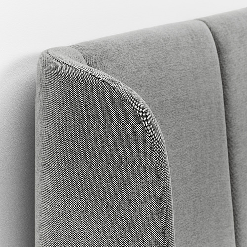 Primer plano del cabecero de la cama TUFJORD, con una tapicería suave y texturizada y un diseño elegante.