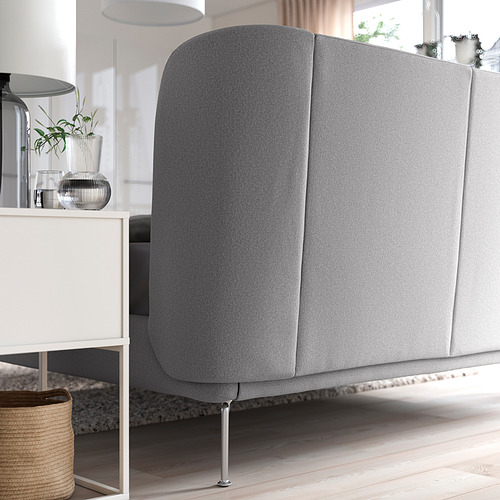 Cama tapizada gris con lados ajustables, que brinda un soporte acogedor y espacio de almacenamiento debajo. Cabecero tapizado para relajarse.