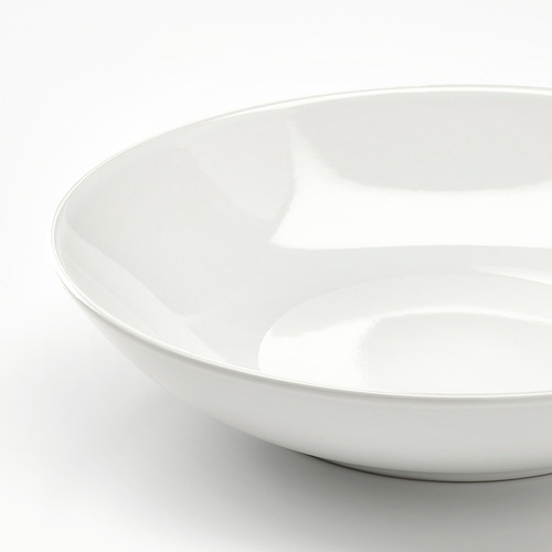 Cuenco blanco sencillo y elegante con un acabado liso y brillante. Bordes redondeados y artesanía robusta.