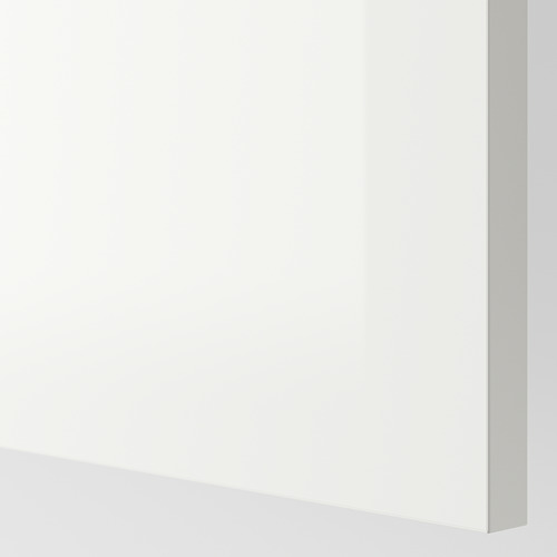 Primer plano de una superficie blanca brillante y sin costuras; Textura suave y acabado reflectante, que muestra material de alta calidad.