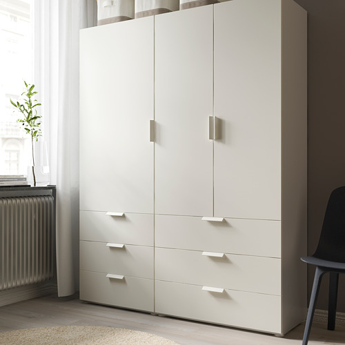 Cómoda moderna FONNES blanca con seis cajones y dos puertas de armario. Perfecto para guardar ropa y equipar varios espacios.