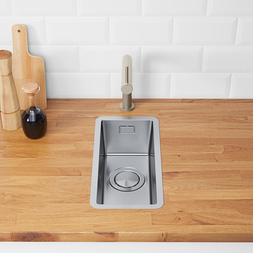 Fregadero de cocina moderno con tapa magnética de acero inoxidable.
