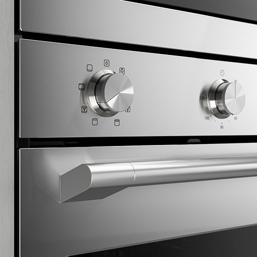 Controles de horno de acero inoxidable, diseño elegante, dos manillas, manilla, aspecto limpio.